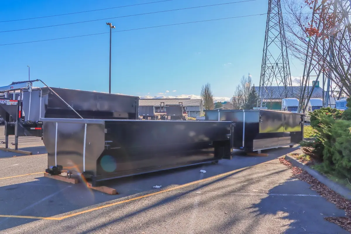 Roll-off dumpster ready for waste disposal at job site for Roofing Dumpster Rental in Geneseo